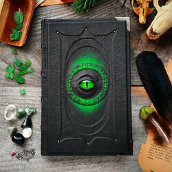 Пазл: Тёмная книга с зелёным сиянием