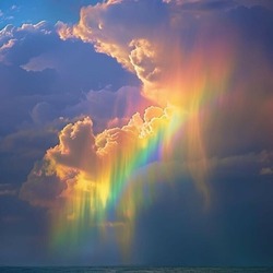 Пазл: Радужные облака над морем